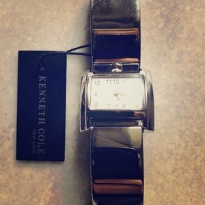 Kenneth Cole silver wristwatch.